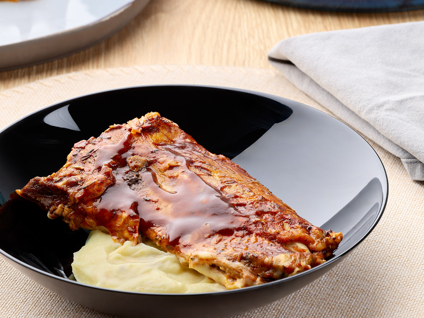 Costella de porc i pure de patata